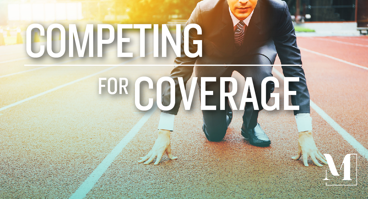 Man in a suit in runners position and the text "competing for coverage."