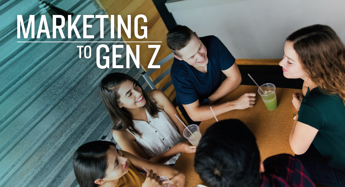 Group of teenagers sitting at a table talking, laughing with text "marketing to Gen Z."